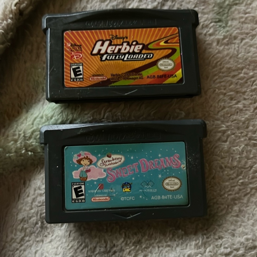 Lot of 2 gambit advanced games strawberry shortcake and herbie fully loadeded